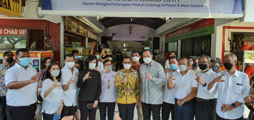 Penerapan Peduli Lindungi di Pasar